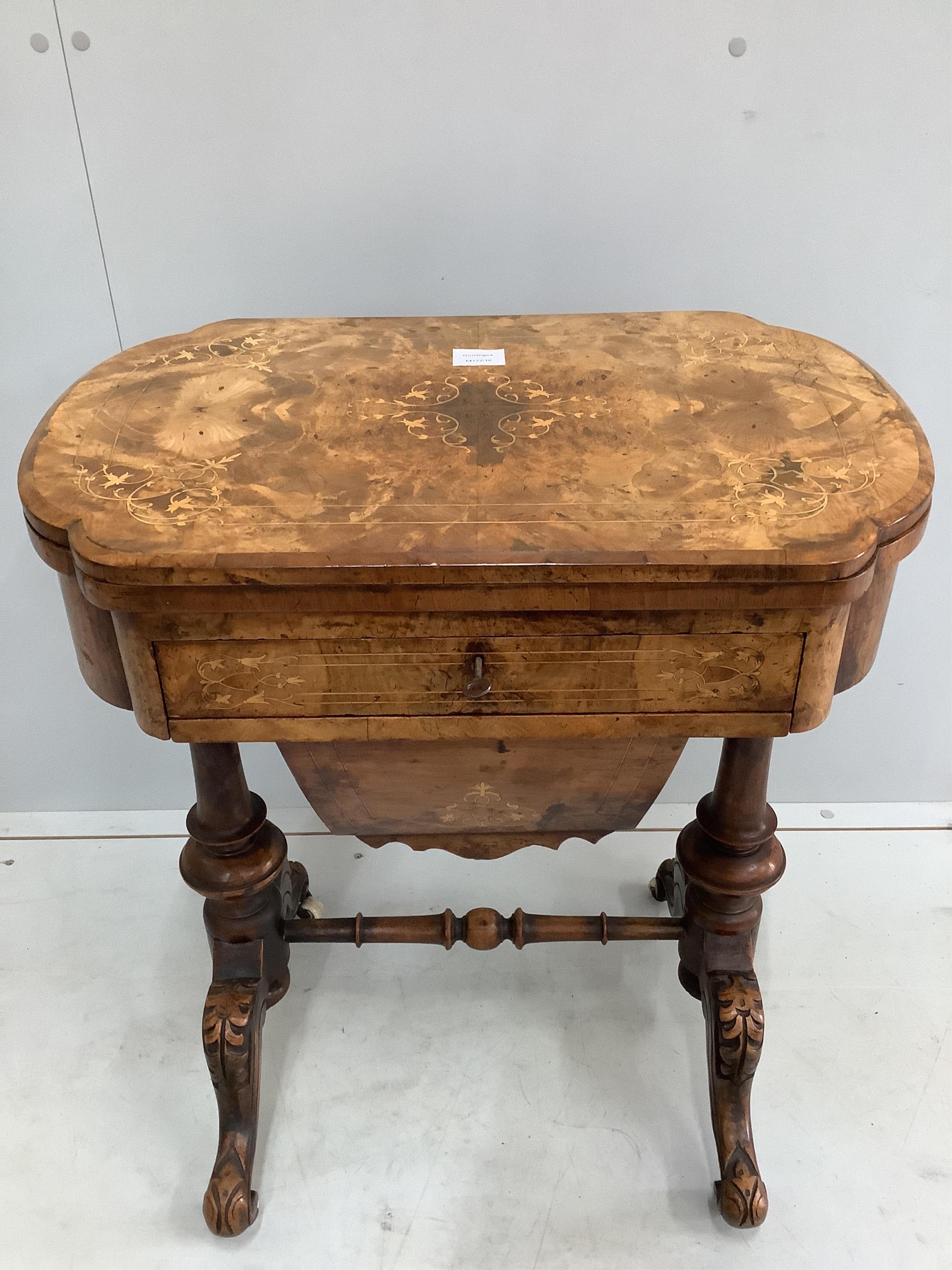 A Victorian marquetry inlaid walnut games / work table, width 61cm, depth 40cm, height 73cm